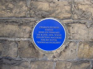 On wall of od Kings Head Inn